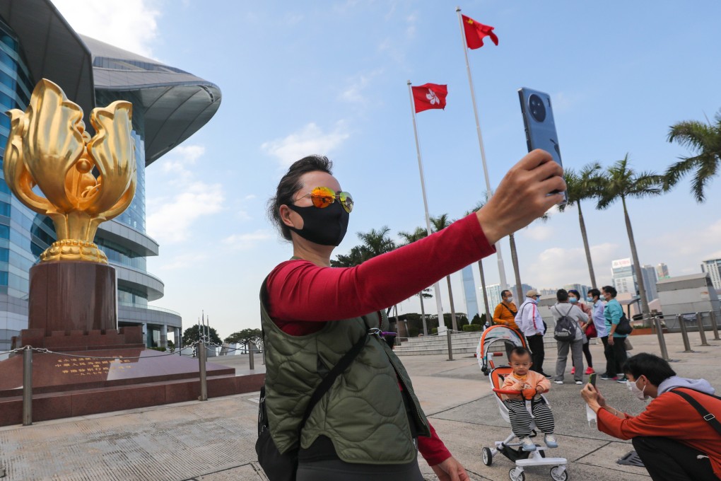 Mainland tourists at Golden Bauhinia Square. Photo: Xiaomei Chen