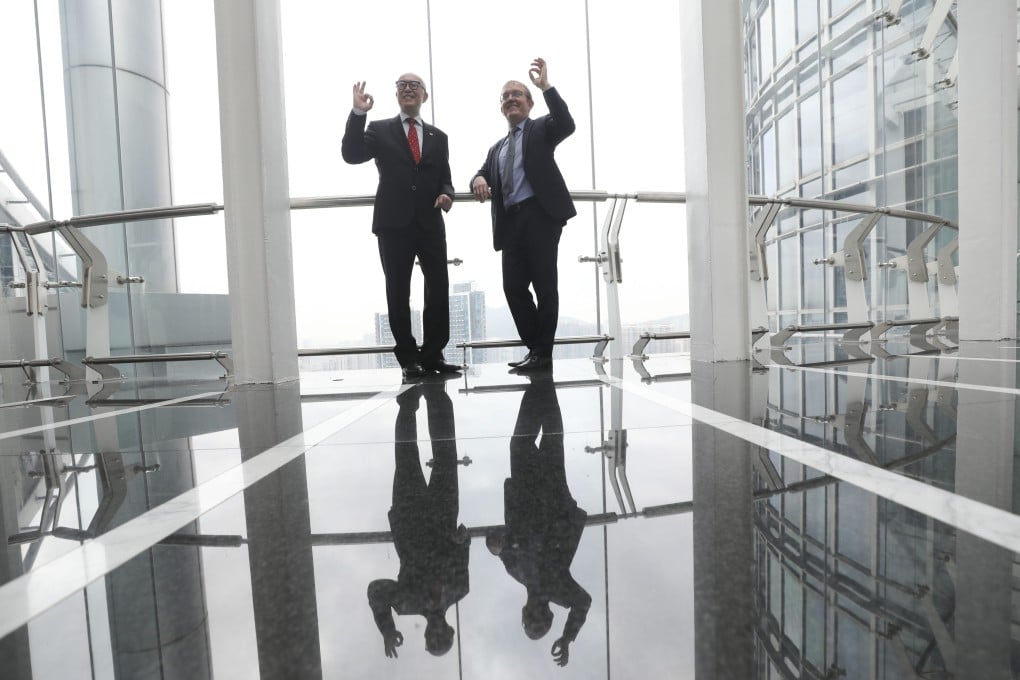 Donald Choi, Chinachem Group executive director and CEO (left) and Alex Keisser, CLPe managing director pose for a photo on February 7, 2023 after signing an agreement to build Hong Kong’s first zero-carbon chiller system in Tsuen Wan. Photo: Xiaomei Chen