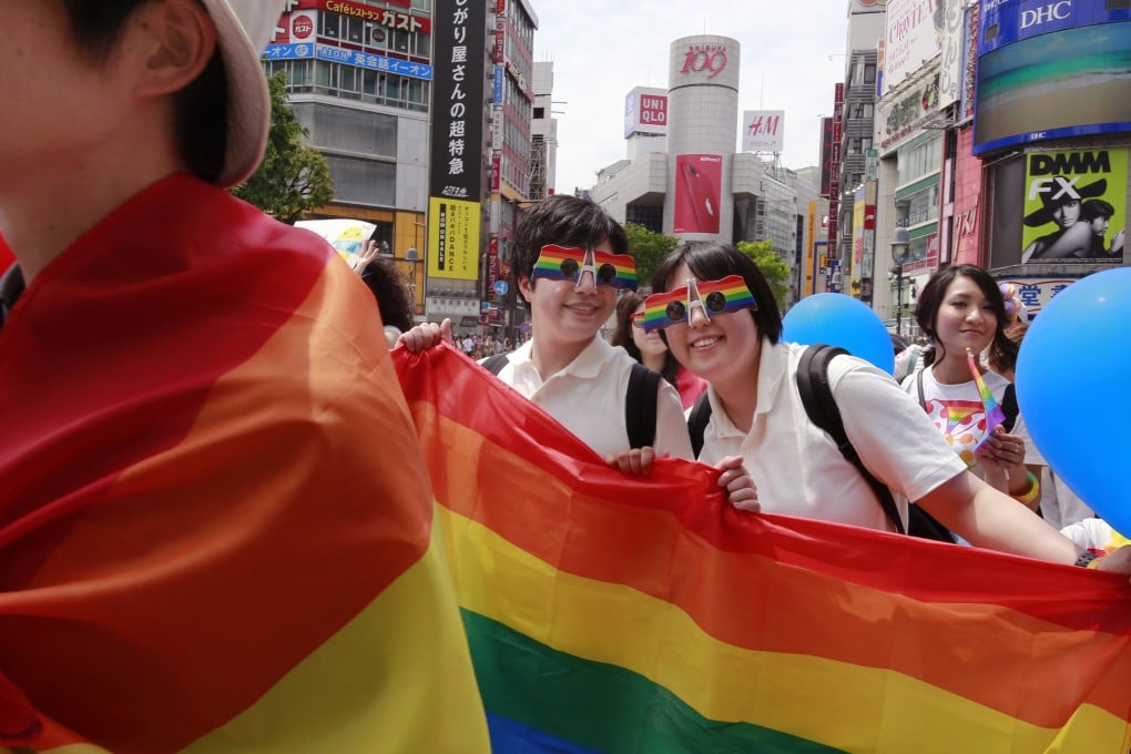 Participants march during the Tokyo Rainbow Pride parade celebrating the LGBT community in Tokyo’s Shibuya district on May 7, 2017. Photo: AP