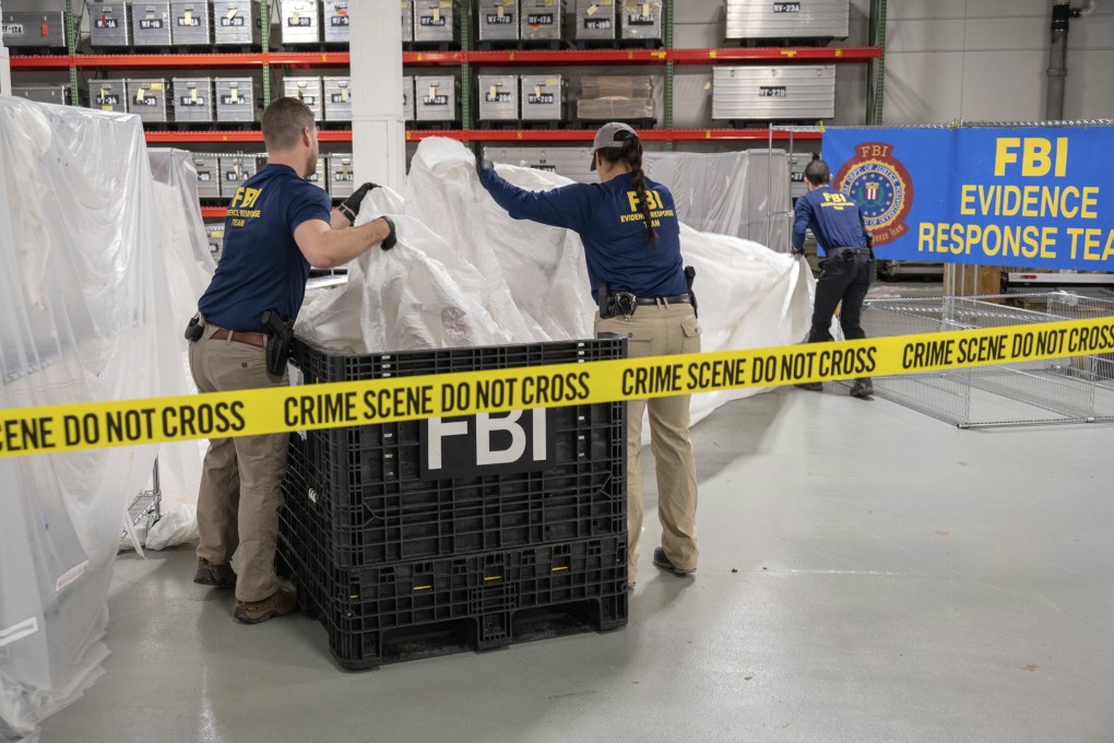 FBI agents process material recovered from the high-altitude balloon recovered off the coast of South Carolina at the FBI laboratory in Quantico, Virginia, on February 9. The United States has blacklisted six Chinese entities it said were linked to Beijing’s aerospace programmes as part of its retaliation over a Chinese spy balloon that traversed US airspace. Photo: FBI via AP