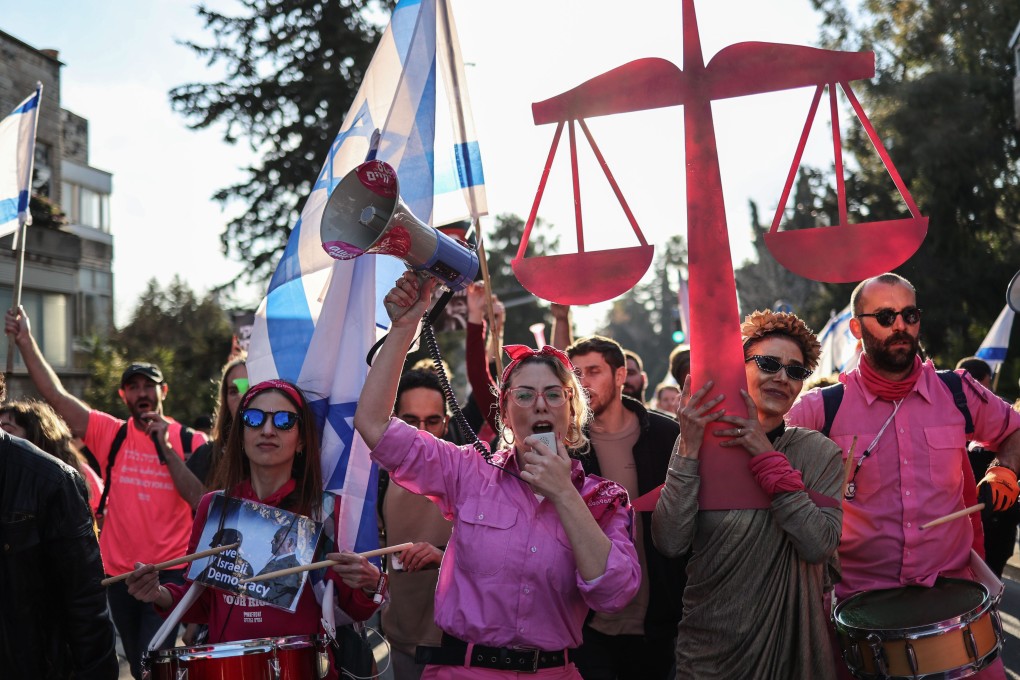 Israelis take part in a protest against the right-wing government outside the Knesset – the country’s parliament. Photo: dpa