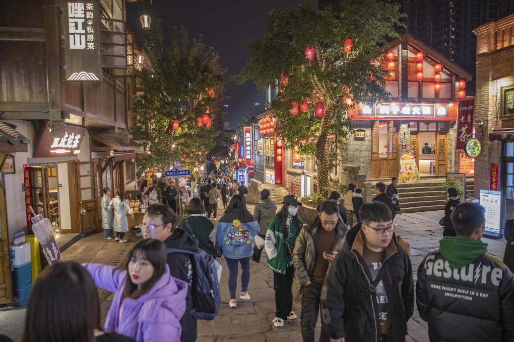 Tourists visit a traditional scenic area in Yuzhong District in southwest China’s Chongqing Municipality. Chongqing has launched a variety of evening activities to boost its economy since the beginning of this year. Photo: Xinhua