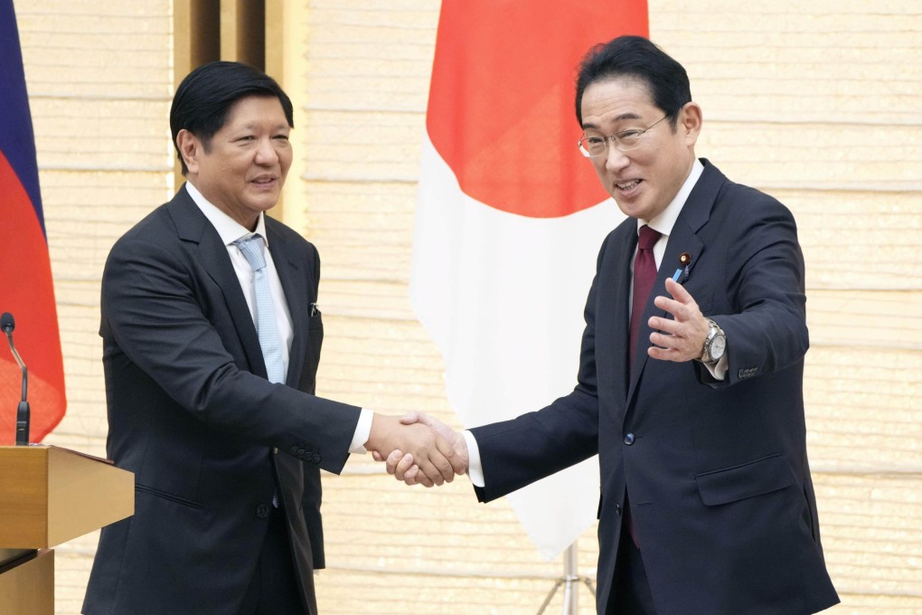 Japanese Prime Minister Fumio Kishida (right) shakes hands with Philippine President Ferdinand Marcos Jnr in Tokyo on February 9. Photo: Kyodo