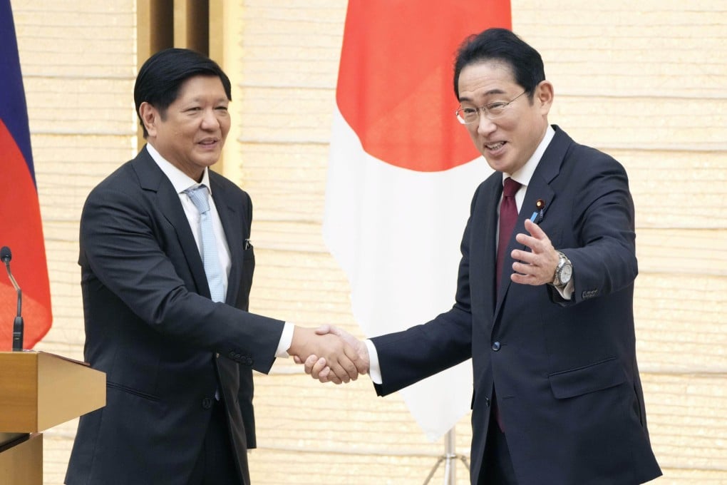 Japanese Prime Minister Fumio Kishida (right) shakes hands with Philippine President Ferdinand Marcos Jnr in Tokyo on February 9. Photo: Kyodo
