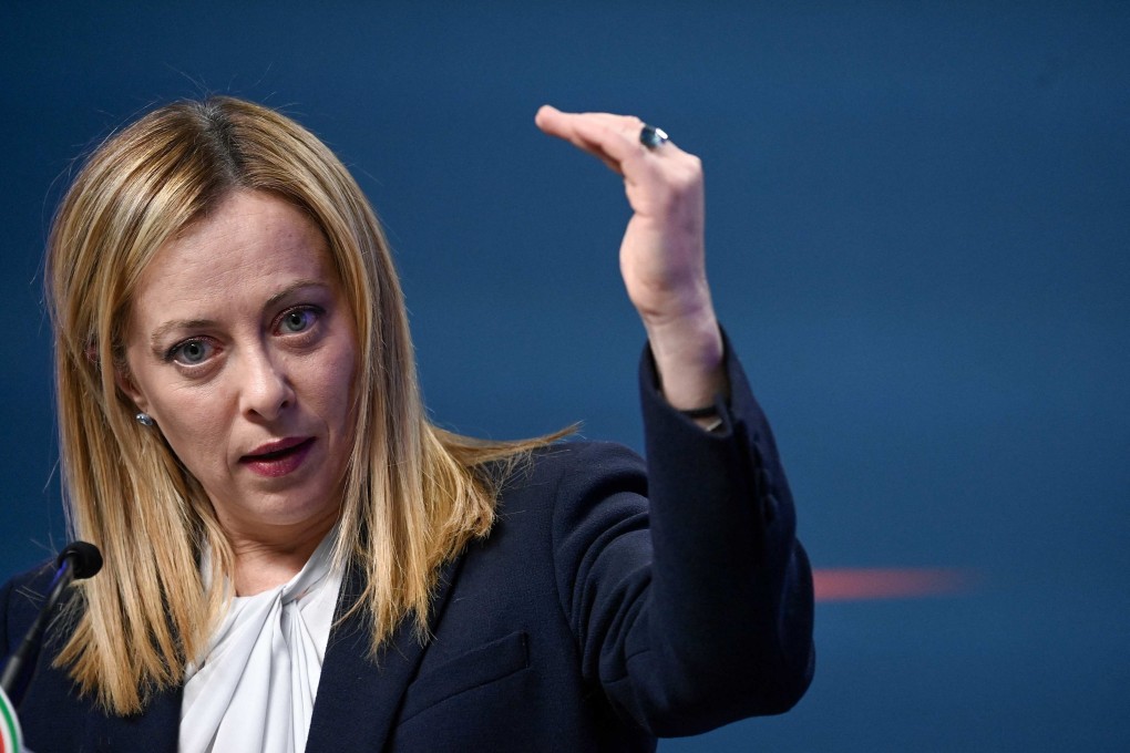 Italy’s Prime Minister Giorgia Meloni gestures as she speaks during a press conference in Brussels on February 10. Photo: AFP