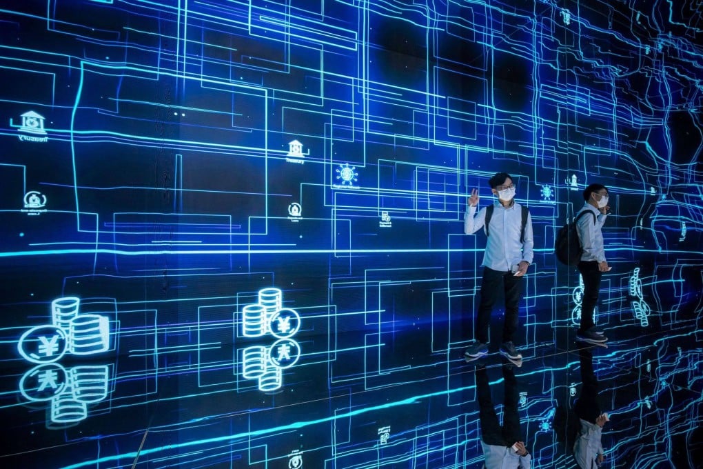 An attendee of the Hong Kong Fintech Week poses for a photo on November 1. The city unveiled its ambition to be a Web3 hub late last year. Photo: Bloomberg