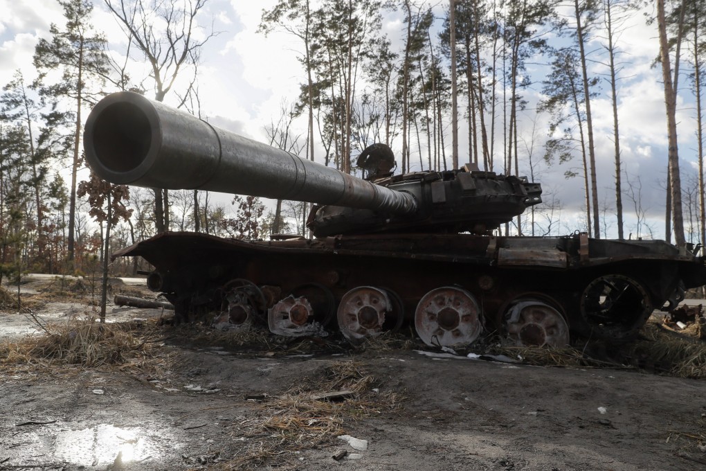 A damaged Russian tank is seen near Dmytrivka village, about 25km (16 miles) from Kyiv, Ukraine on Tuesday. Photo: EPA-EFE