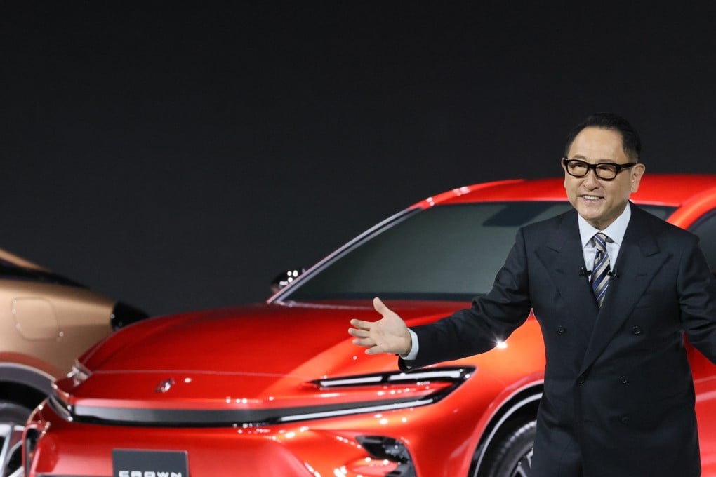 Toyota president Akio Toyoda presents new models at an event in July 22. His company and other Japanese carmakers risk losing out to China in the market for electric vehicles. Photo: Getty Images