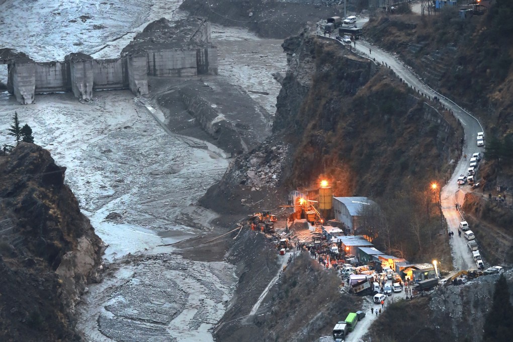 Rescuers attend to a collapsed dam in Uttarakhand following a deadly glacial burst in 2021. Photo: AP