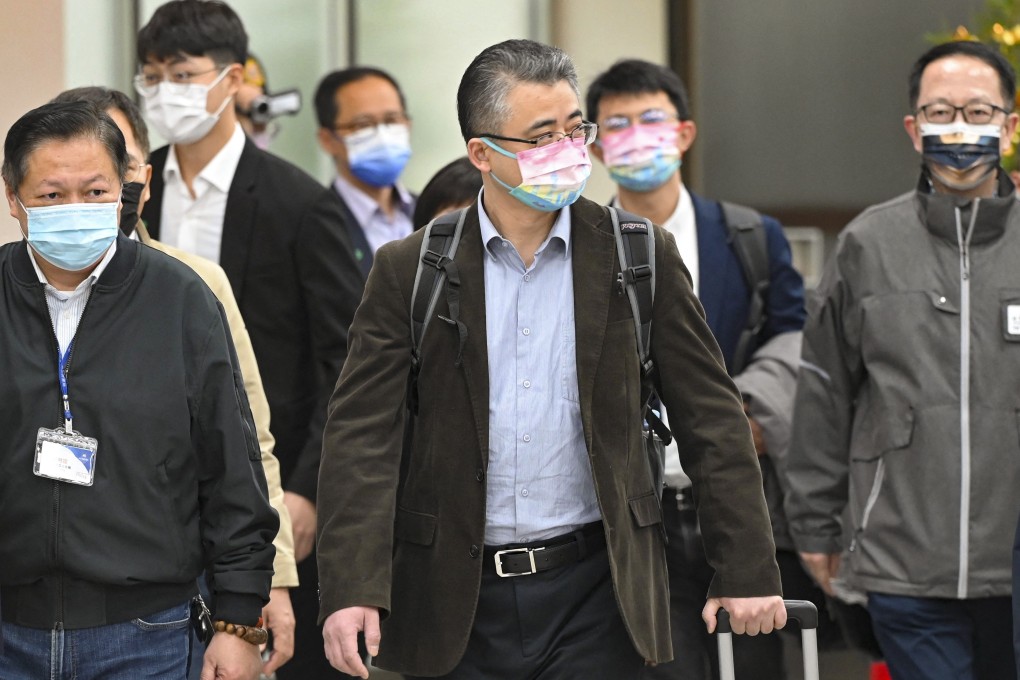 Li Xiaodong (centre) and the other members of the Shanghai delegation arrive in Taipei on Saturday. Photo: AFP