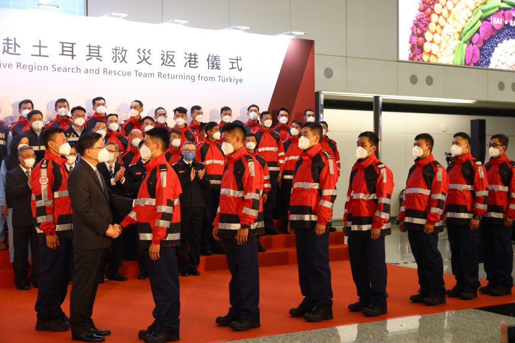 Hong Kong rescue team given hero&rsquo;s welcome led by Chief Executive 