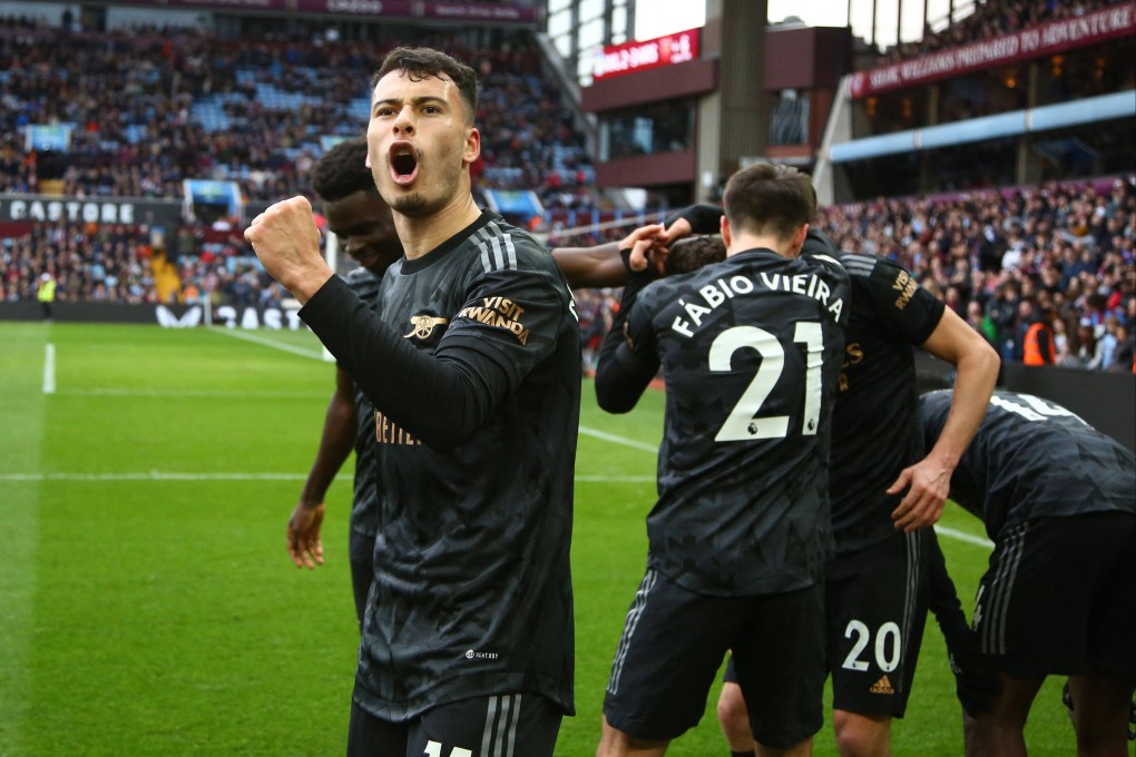 Arsenal’s Brazilian midfielder Gabriel Martinelli (left) celebrates after a shot from Jorginho ends up in the net, rebounding off Aston Villa goalkeeper Emiliano Martinez for an own-goal. Photo: AFP