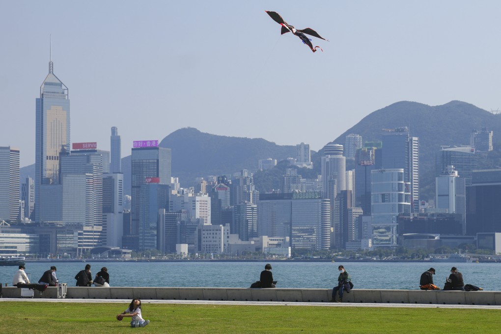 A girl flies a kite at the West Kowloon Cultural District waterfront on February 15. With virtues such as an open economy and low taxation, Hong Kong has always attracted people who have confidence in themselves and risk takers who seek a challenge. Photo: Sam Tsang