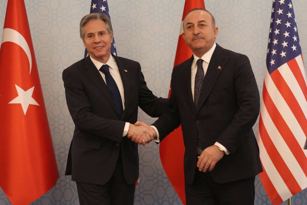 US Secretary of State Antony Blinken (left) and Turkish Foreign Minister Mevlut Cavusoglu shake hands in Ankara on Monday. Photo: AFP