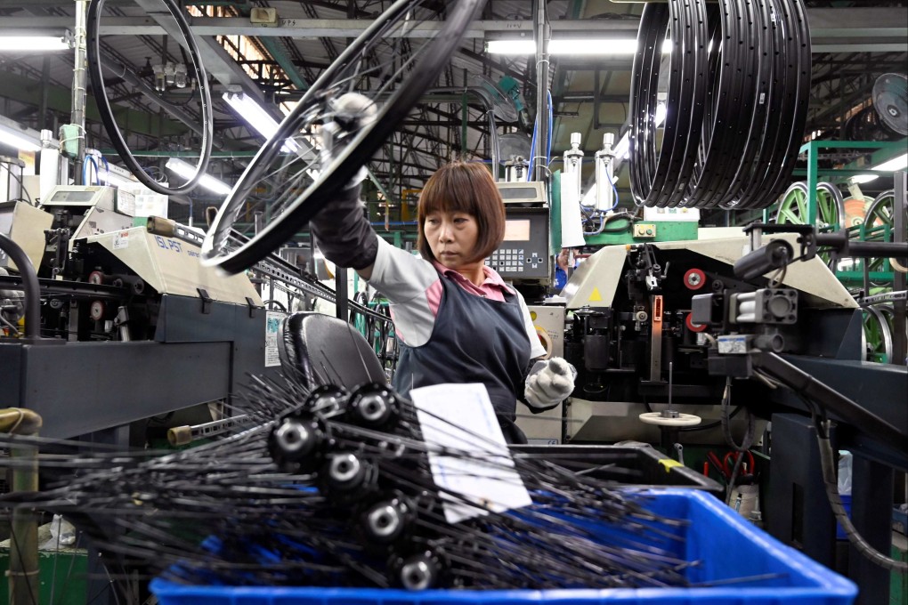 A slump in demand for Taiwan’s signature factory-made exports, from semiconductor chips to e-bikes, is hurting the economy. Photo: AFP