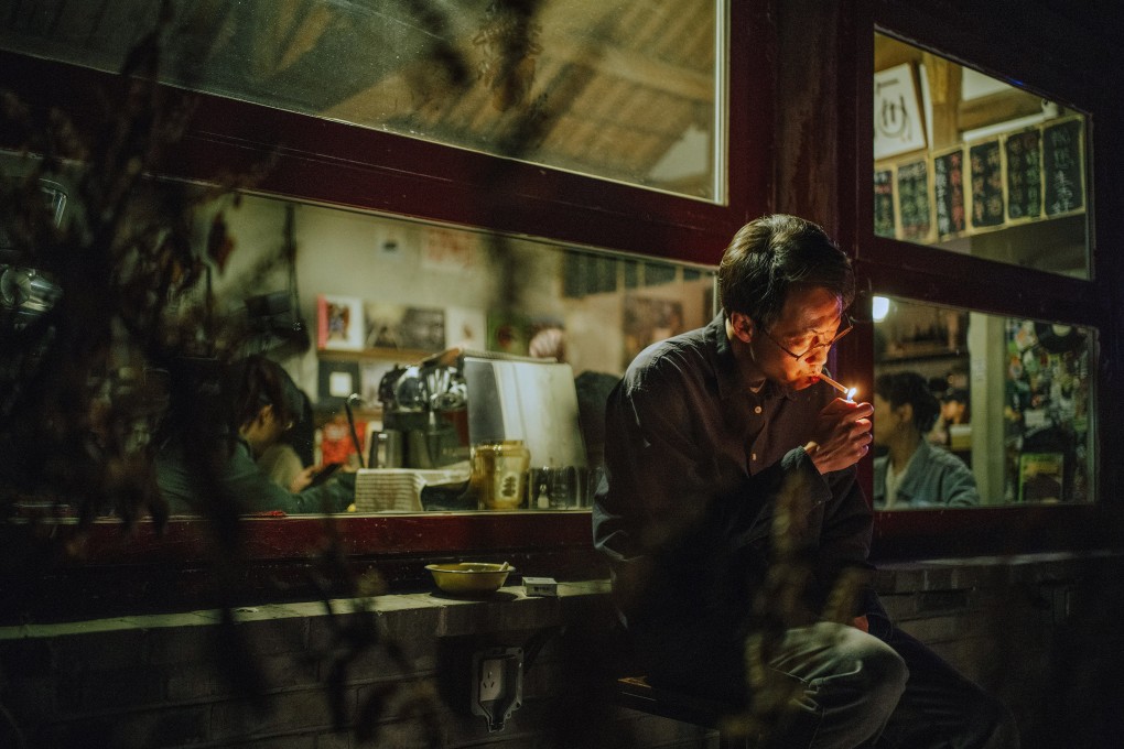 Xin Baiqing as Gu Wentong in a still from The Shadowless Tower, directed by Zhang Lu. Gu is a middle-aged food critic and divorcee in a relationship with a much younger photographer (Huang Yao) in this slow-moving drama that premiered in competition at the Berlin International Film Festival.