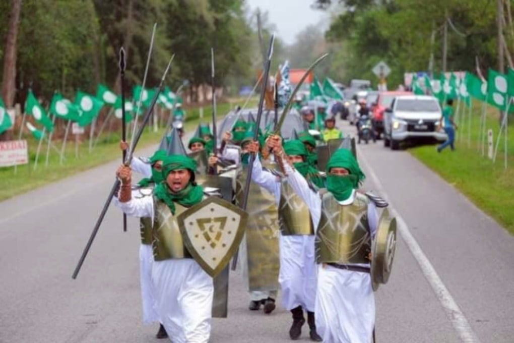 Youth members of the Islamist PAS party march in military-style outfits in Terengganu, Malaysia. Photo: Facebook/Faizal Rahman