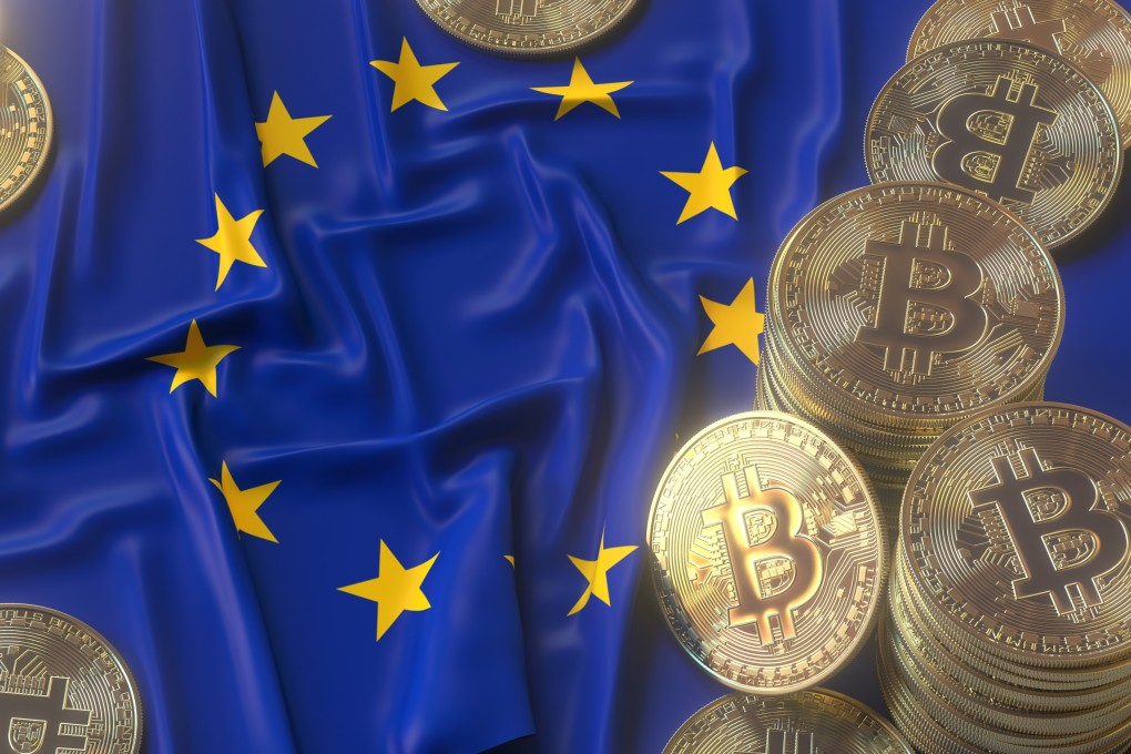 Representations of bitcoin tokens shown on top of a European Union flag. Photo: Shutterstock