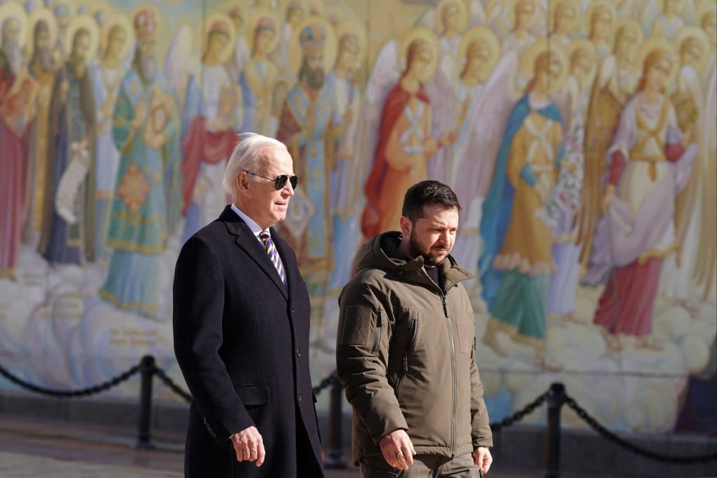 US President Joe Biden walks next to Ukrainian President Volodymyr Zelensky in Kyiv on Tuesday. Photo: AFP