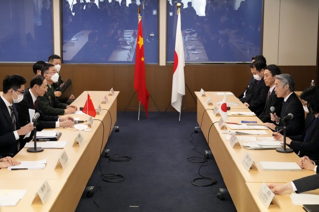 Japanese deputy foreign minister Shigeo Yamada (second right) speaks to his Chinese counterpart Sun Weidong (second left) during the security dialogue in Tokyo on Wednesday. Photo: AP