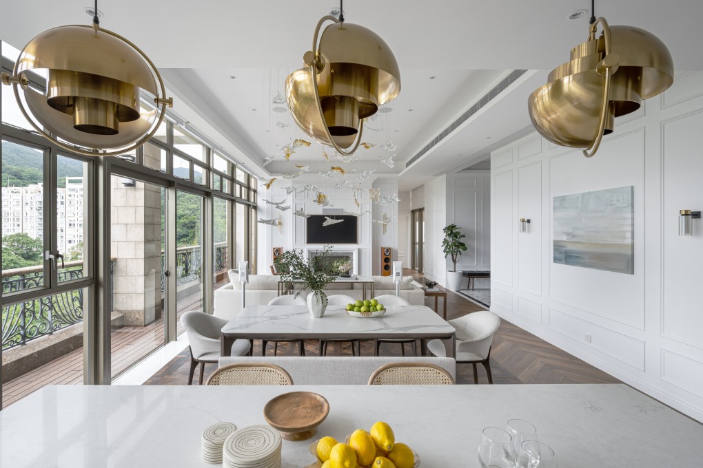 The 850 sq ft living area, divided into two zones, at the Sha Tin home of Alex Lanoie and Kerry Li. The Grande Interior Design studio renovated the 2,293 sq ft penthouse apartment with private rooftop swimming pool, adding a study, nursery and dressing room. Photo: Dick Liu