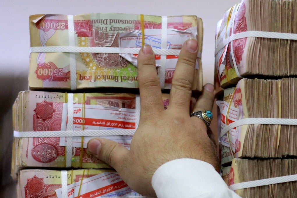 Iraq is allowing for trade in private sector imports from China to be settled in the yuan as well as the dinar (pictured), and the Chinese currency will be provided to Iraqi lenders. Photo: AFP