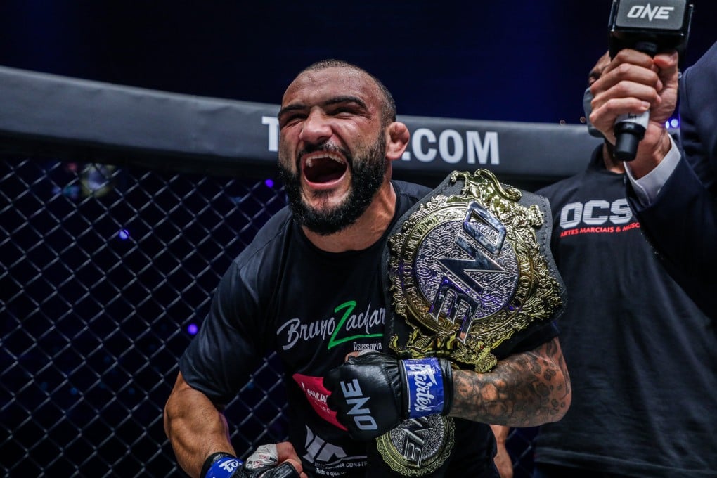 John Lineker reacts after winning the ONE bantamweight MMA title with a knockout of Bibiano Fernandes. Photos: ONE Championship.