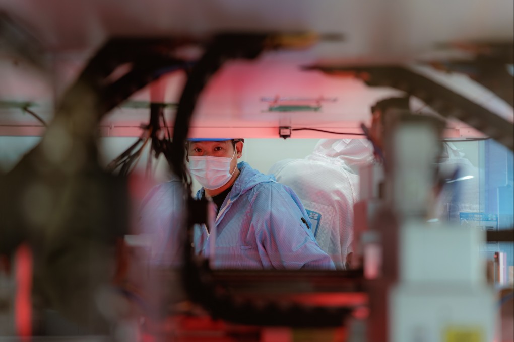A worker makes solar energy parts and batteries at a factory in Suqian, Jiangsu province. How China meets its energy needs has massive global implications. Photo: EPA-EFE