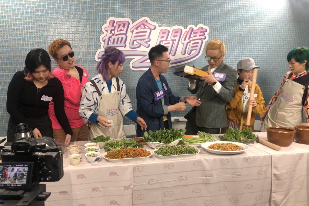 Members of Chinese art collective Bolohope and guests “Kai Brother Fred” and Qidi Feng (third and fourth from right) prepare for an improvised performance at Hanart TZ Gallery, in Hong Kong, on February 18, 2023. Photo: Enid Tsui