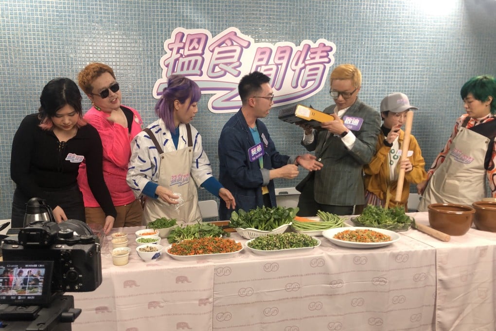 Members of Chinese art collective Bolohope and guests “Kai Brother Fred” and Qidi Feng (third and fourth from right) prepare for an improvised performance at Hanart TZ Gallery, in Hong Kong, on February 18, 2023. Photo: Enid Tsui