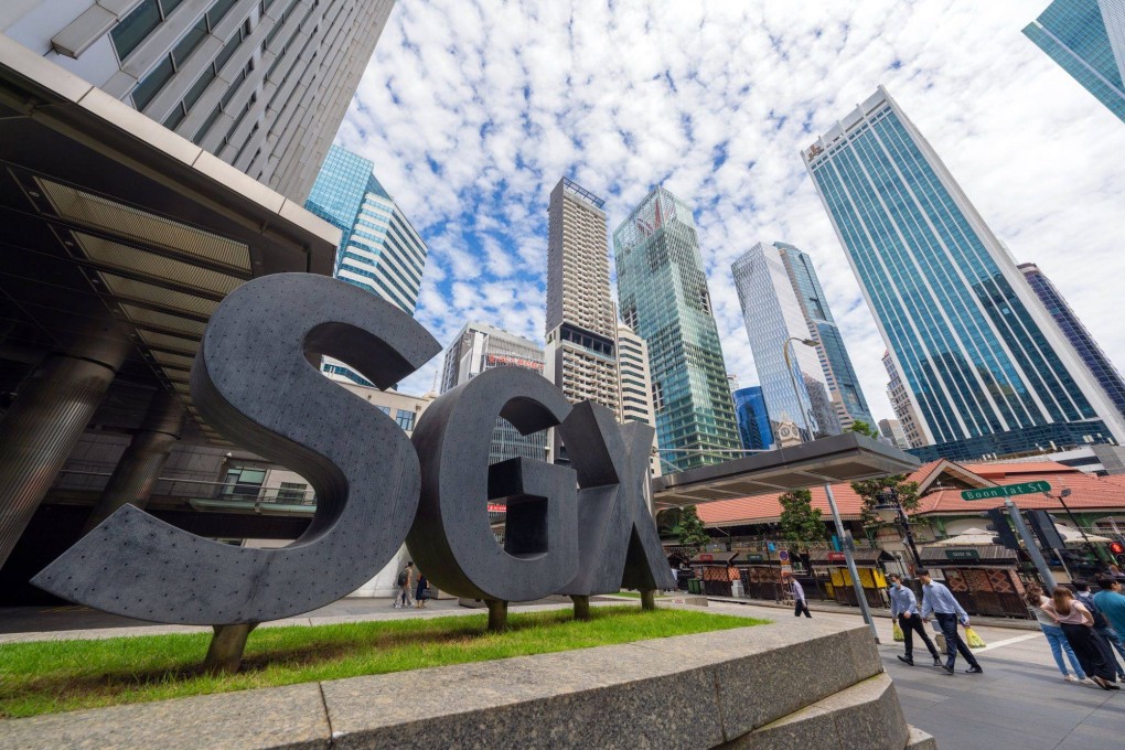 Signage outside the headquarters of Singapore Exchange Ltd. Research suggests pay disclosures have done more to increase executive compensation than to suppress it. Photo: Bloomberg