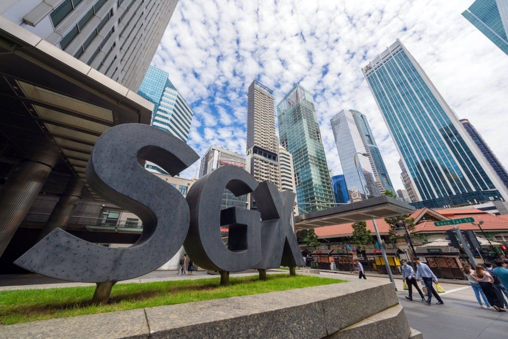 Signage outside the headquarters of Singapore Exchange Ltd. Research suggests pay disclosures have done more to increase executive compensation than to suppress it. Photo: Bloomberg