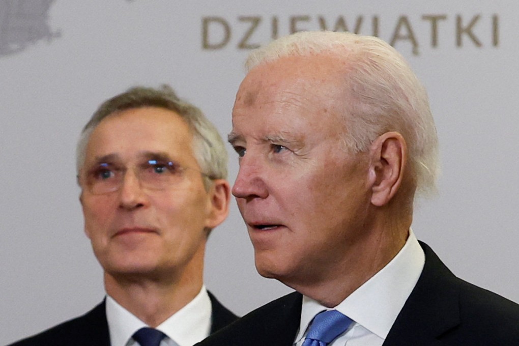 US President Joe Biden (right) and Nato Secretary General Jens Stoltenberg pose for a group photo with Bucharest Nine leaders on Wednesday, during Biden’s visit to Poland to mark the first anniversary of Russia’s invasion of Ukraine. Photo: Reuters