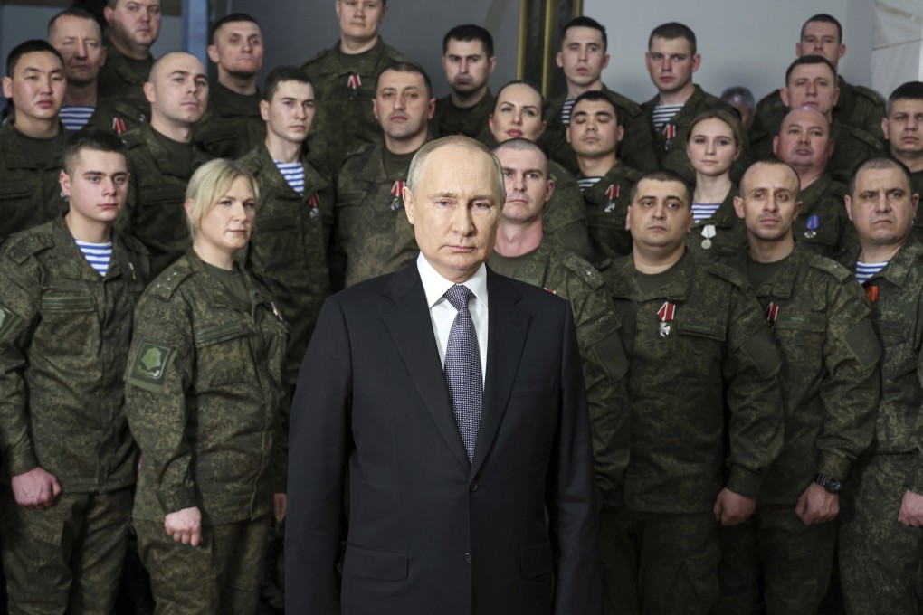 Russian President Vladimir Putin with some of his troops. File photo: via AP