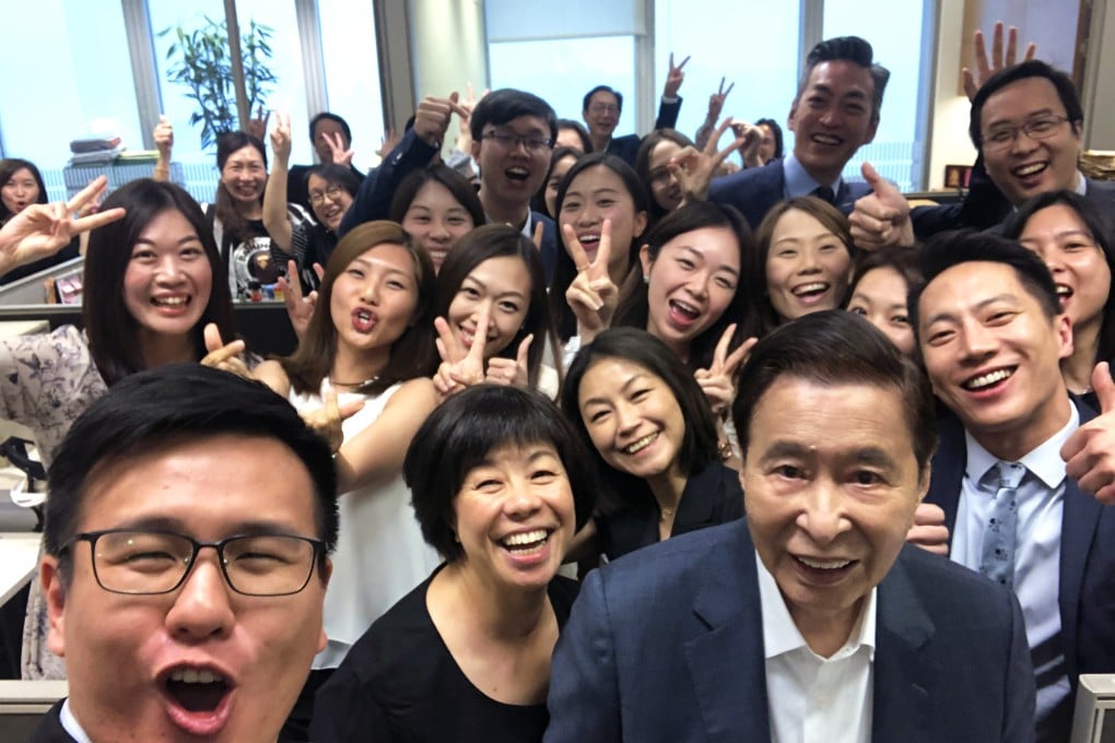 Lee Shau-kee, Hong Kong’s second richest man, pictured (front right) just before retiring from Henderson Land Development in 2019. Photo: SCMP Handout