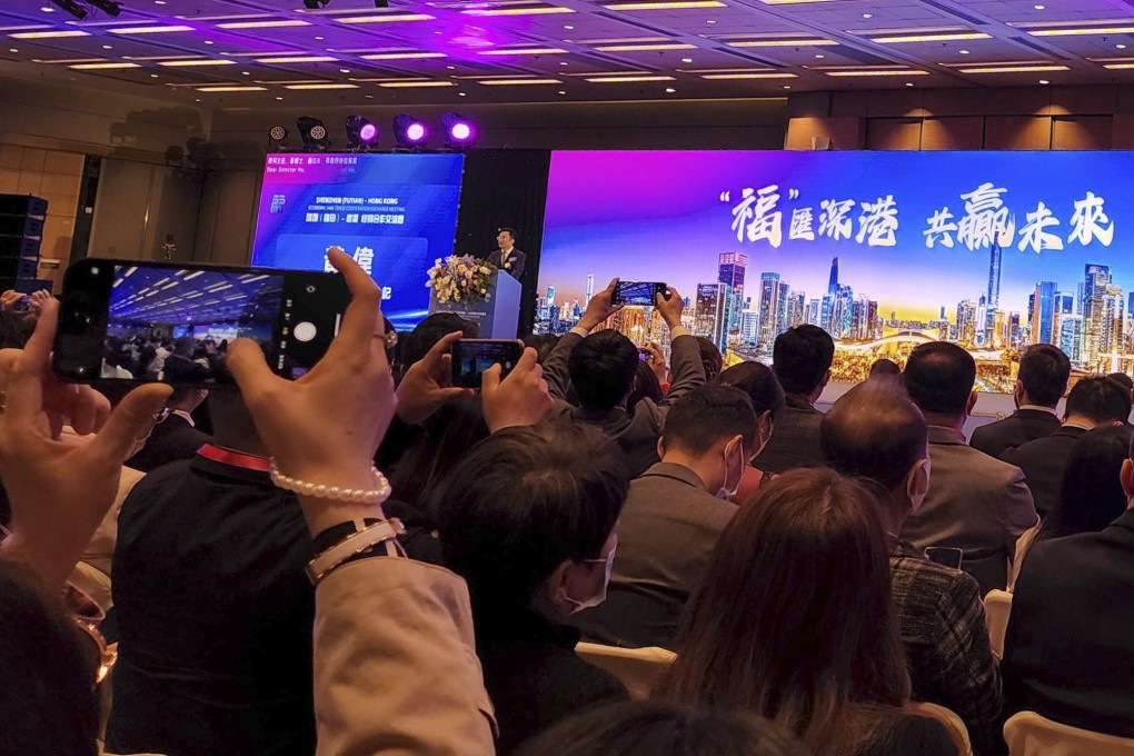 Government officials from Hong Kong and Shenzhen’s Futian district signed 25 agreements on Friday to enhance cooperation in a number of fields, including business and technology. Photo: Iris Ouyang