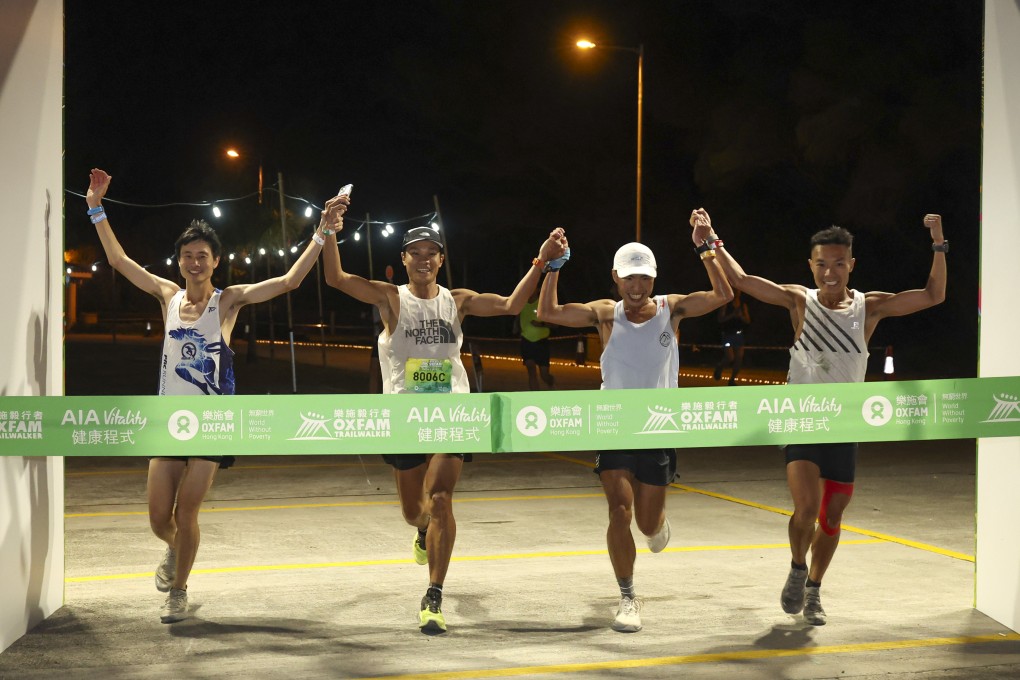 From left to right, Woody Wu Man-tsung, Wong Ho-chung; Tsang Fuk-cheung and Joseph Yeung of Team 8006, first finish the 2023 Oxfam Trailwalker in 11 hours and 38 minutes at Yuen Long. Photo: Edmond So