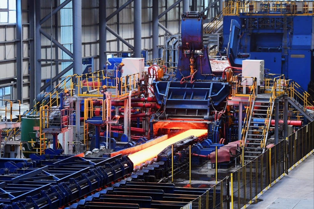 A rolling mill of a Tangsteel plant under the Hebei Iron and Steel Group in Laoting county in north China’s Hebei province in September last year. Steelmaking contributes around 17 per cent of China’s annual emissions. Photo: Xinhua
