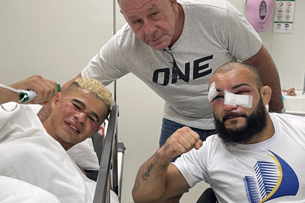 Fabricio Andrade (right) and John Lineker pose at the hospital in Bangkok with Lineker’s manager Alex Davis (centre). Photo: Twitter/@Alex Davis