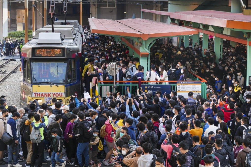 Veteran light railway train class reaches end of line and hundreds turn out to see its last run. Photo: Sam Tsang