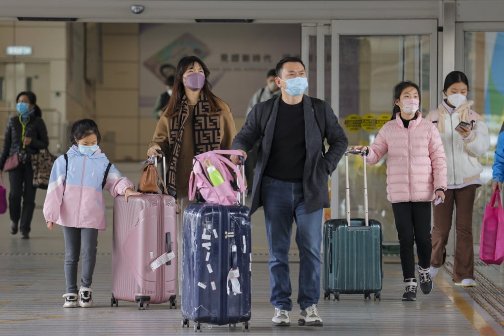 Travellers arrive in Hong Kong from mainland China. Photo: Jelly Tse
