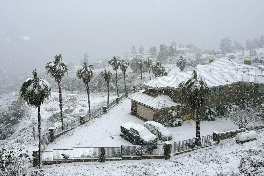 Snow blankets a home in Rancho Cucamonga, California, on Saturday. Photo: AFP