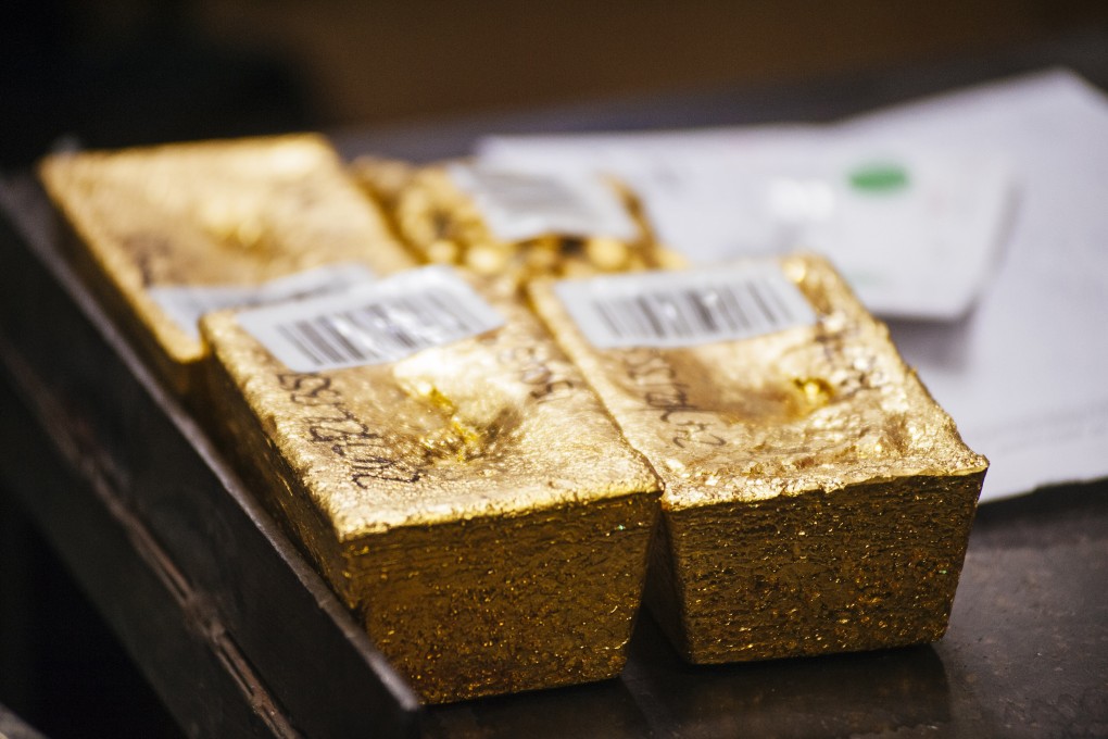 Gold bullion bars. Russians working for a mining firm in Sudan are being investigated over alleged gold smuggling. Photo: Bloomberg