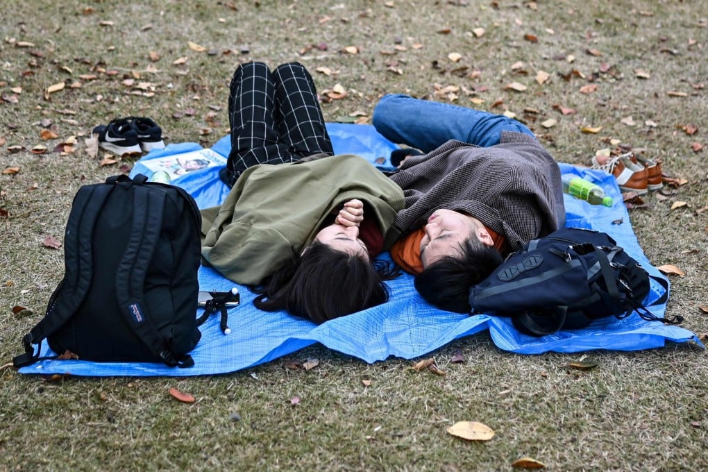 Japan’s population has been getting married later in life and having fewer children, primarily as a result of financial pressures, but one politician disagrees, claiming it’s due to a lack of “romantic ability” among the younger generation. Photo: AFP/File