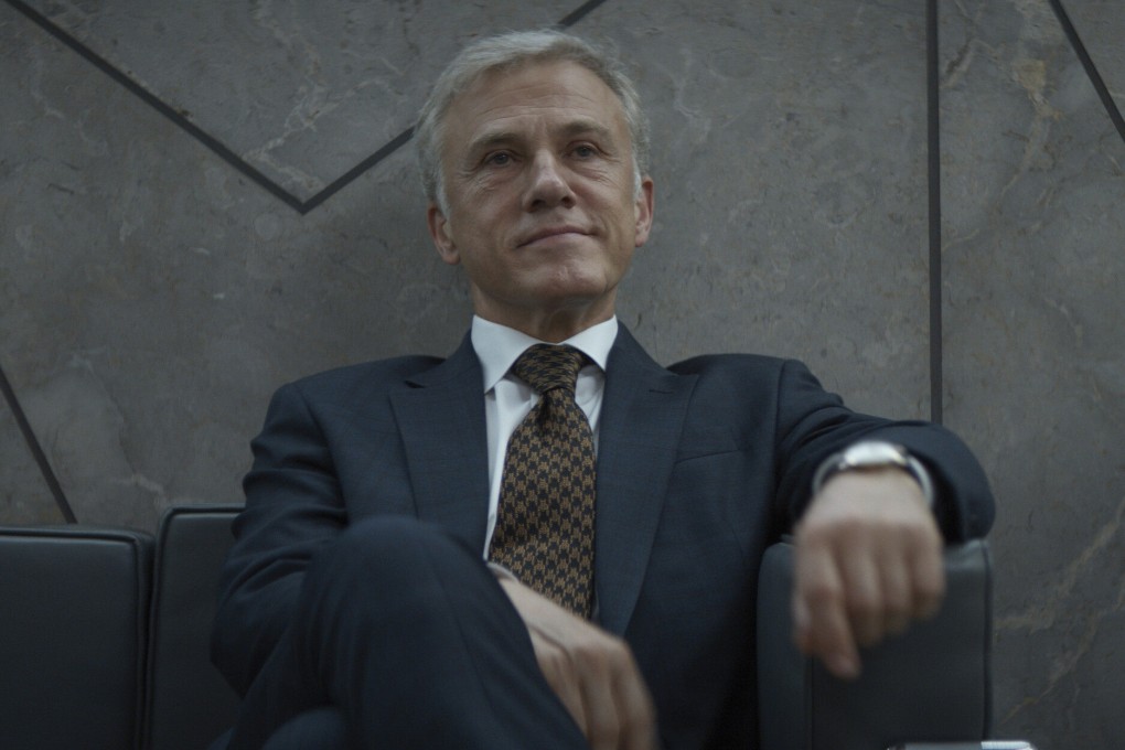 Christoph Waltz as evil tech boss Regus Patoff, in a still from The Consultant. Amazon’s new show satires toxic workplaces in the post-pandemic world. Photo: Amazon Prime Video