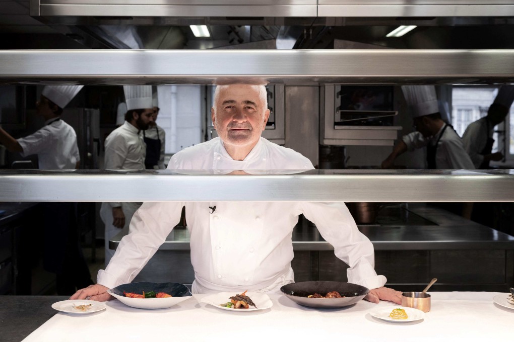 French chef Guy Savoy in the kitchen of his eponymous restaurant in the Monnaie de Paris in the French capital, which has held three Michelin stars since 2002 but has been stripped of one in the new edition of the Michelin Guide. Another three-Michelin-star French restaurant, and 20 two-star restaurants, have also lost a star. Photo: AFP