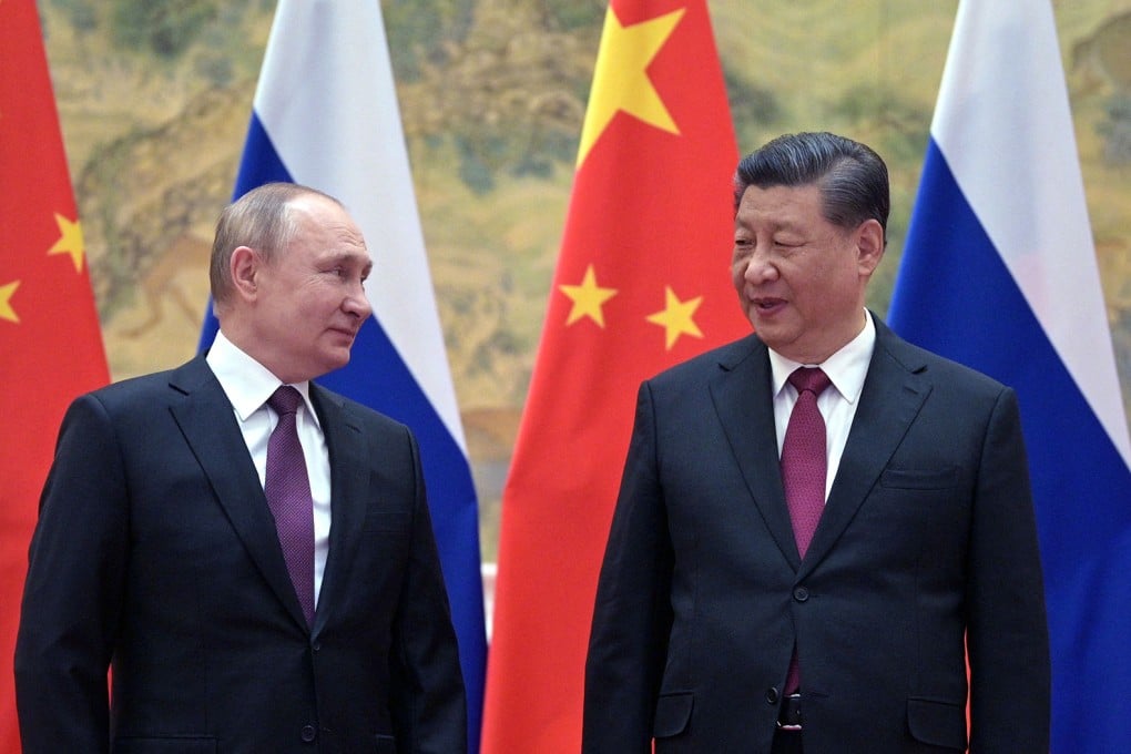 Russian President Vladimir Putin and Chinese President Xi Jinping pose for a photograph during their meeting in Beijing, on February 4, 2022. Photo: Getty Images
