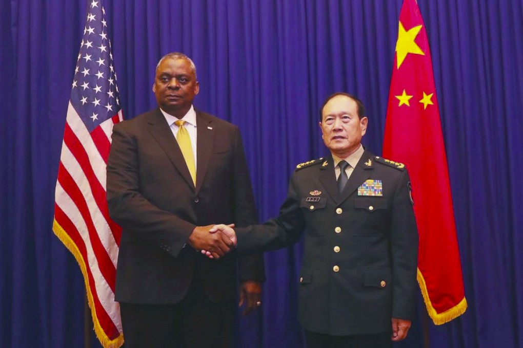 Chinese Defence Minister Wei Fenghe (right) shakes hands with his US counterpart Lloyd Austin on November 22 last year in Cambodia, in this photo captured from Twitter. There are many promising opportunities for US-China cooperation on reducing military AI risks. Photo: Twitter