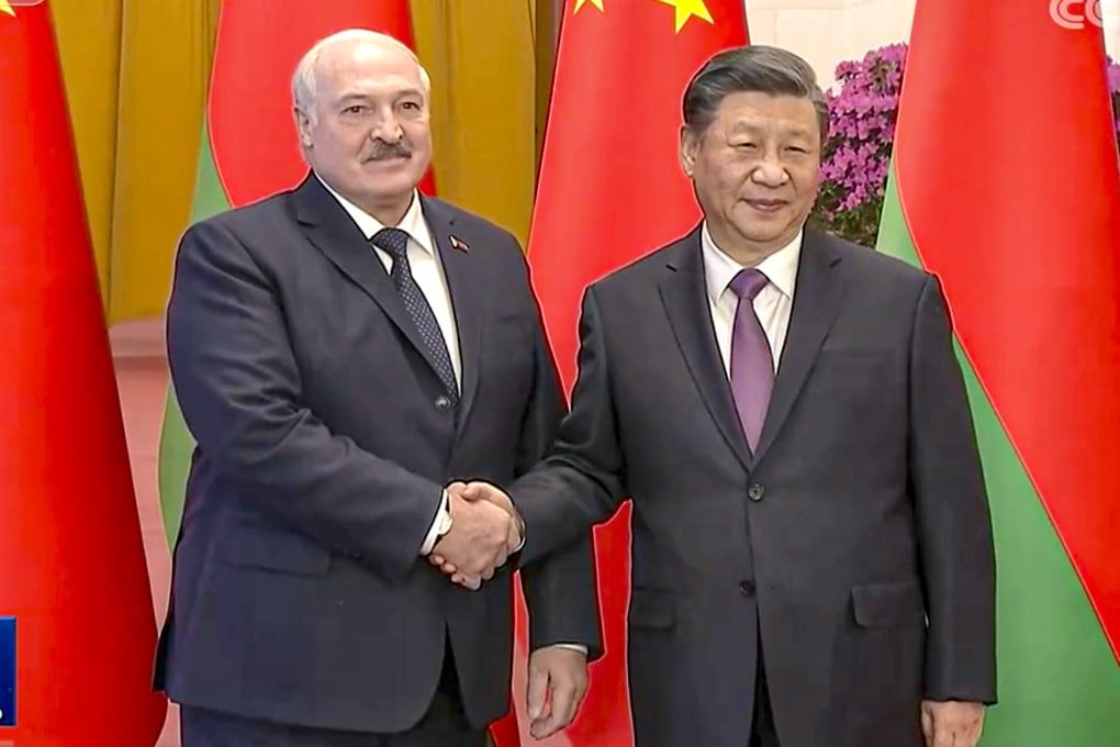 Chinese President Xi Jinping (right) shakes hands with Belarusian President Alexander Lukashenko in Beijing on Wednesday. Photo: CCTV