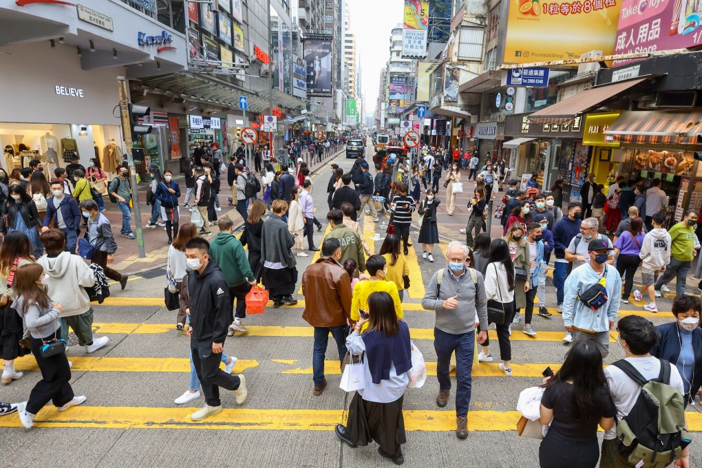 Shoppers are seen in Mong Kok. The city’s mask mandate is now going to be lifted, but that doesn’t mean the dangers are gone. Photo: Dickson Lee